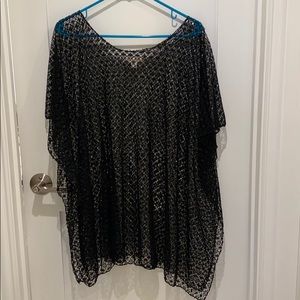 Women’s black swim suit over up